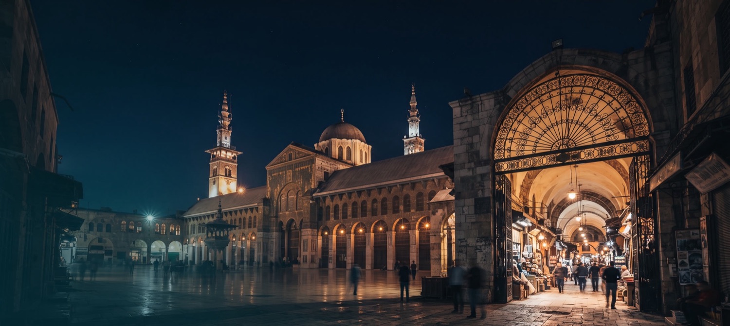 The Umayyad Mosque courtyard and covered souq in Damascus at night